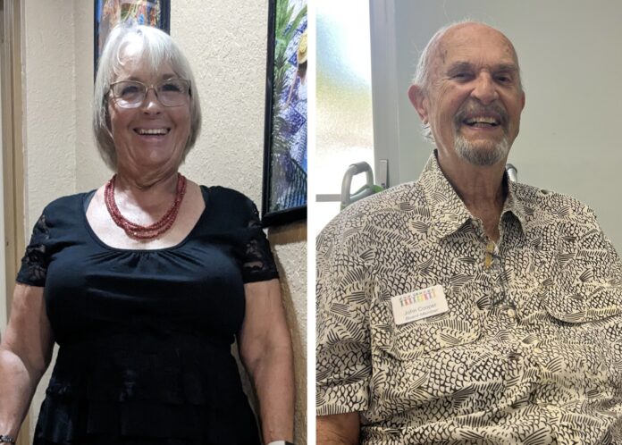 a man and a woman standing next to each other